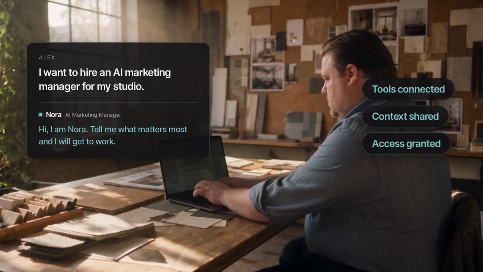 A studio owner reviews plans with clients while Nora's marketing updates arrive