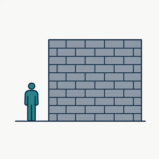 A small figure beside a large grey block of code bricks.